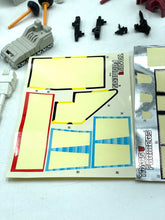 Load image into Gallery viewer, Transformers G1 Metroplex robot accessories including weapons on a white background.