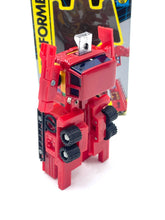Load image into Gallery viewer, Side view of Transformers G1 Inferno showing detailed design with red and yellow colors.