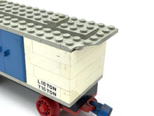 Carica l'immagine nel visualizzatore di Gallery, LEGO 720 - 3 Wagon side view featuring a red and black design with a blue top and detailed sides.
