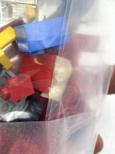 Carica l'immagine nel visualizzatore di Gallery, Assorted LEGO building blocks in various shapes and colors on a transparent background.