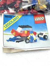 Carica l'immagine nel visualizzatore di Gallery, LEGO instruction manual with illustrated cover in folded position.