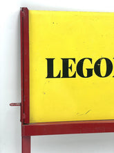 Carica l'immagine nel visualizzatore di Gallery, Close-up detail of the LEGOLAND sign with a red frame and prominent text.