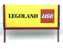 Carica l'immagine nel visualizzatore di Gallery, Detail of the yellow sign displaying 'LEGOLAND LEGO' with a bordered design.