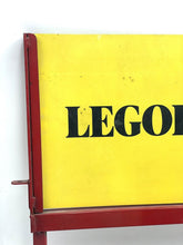 Carica l'immagine nel visualizzatore di Gallery, Front view of the yellow sign featuring 'LEGOLAND LEGO' framed against a white background.