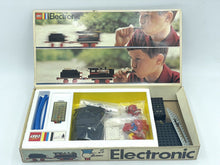 Load image into Gallery viewer, Detail close-up of LEGO pieces from the electronic train set.