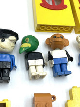Carica l'immagine nel visualizzatore di Gallery, LEGO 70's Fabuland colorful mini figures featuring various characters in black, brown, green, and white.