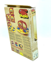 Load image into Gallery viewer, LEGO DUPLO spin a coaster set packaging back view showing product details and illustrations.