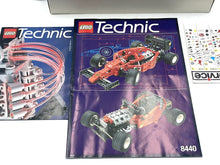 Carica l'immagine nel visualizzatore di Gallery, Close-up of LEGO Technic 8440 instruction manuals featuring colorful images.