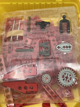 Carica l'immagine nel visualizzatore di Gallery, Red LEGO parts in a storage bag, including various plastic components.