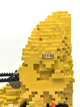 Carica l'immagine nel visualizzatore di Gallery, LEGO structure detail showing a brick pattern and curved shape.