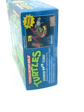 Load image into Gallery viewer, BANDAI Playmates TMNT Sewer Party Tube back view with detailed description.