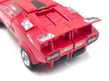 Load image into Gallery viewer, Back view of Takara Transformers G1 Sideswipe featuring rear design and exhaust details.