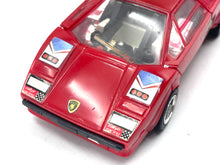 Load image into Gallery viewer, Front view of Takara Transformers G1 Sideswipe displaying decals on the red toy car.