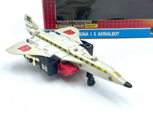 Load image into Gallery viewer, Side view of Silverbolt jet with wings and decorative stickers.