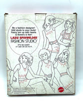 Load image into Gallery viewer, Mattel 1974 Lady Spinwelder Fashion Studio Kit back cover displaying game details and illustrations.