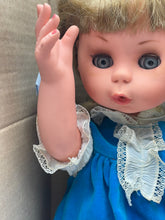 Load image into Gallery viewer, Close-up of Italocremona Fanni doll with hand raised, highlighting curly hair and facial features.