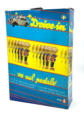 Carica l'immagine nel visualizzatore di Gallery, Detail of a colorful game box with graphic design and illustrations.
