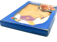 Load image into Gallery viewer, Sebino doll dress packaging side view with angled perspective and vibrant colors.