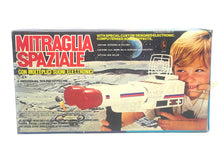 Load image into Gallery viewer, Ceppiratti packaging view of the toy gun with child holding it, featuring space theme colors.