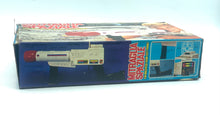 Load image into Gallery viewer, Ceppiratti side angle of the toy gun highlighting graphics and toy details.