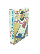 Load image into Gallery viewer, Del Ponte board game Pop Corn side view showcasing game title and illustration.