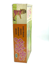 Load image into Gallery viewer, Ideal Toy Giggles doll side view of the packaging showcasing colorful design.