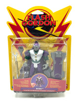 Carica l'immagine nel visualizzatore di Gallery, Bandai Flash Gordon Evil Emperor Ming action figure in packaging with purple and yellow colors.
