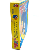 Carica l'immagine nel visualizzatore di Gallery, Mattel Rainbow Brite colour pockets side view showcasing the colorful design and game title.