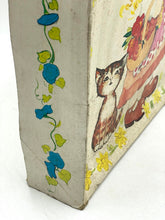 Load image into Gallery viewer, Side view of the packaging edge showcasing decorative flowers and text.