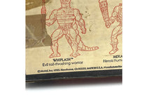 Load image into Gallery viewer, Mattel Masters of the Universe Snake Mountain detail close-up featuring character sketches.