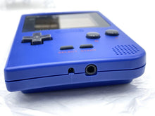 Load image into Gallery viewer, Side view of the blue Nintendo Game Boy Pocket console displaying the audio jack and button layout.