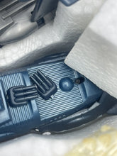 Load image into Gallery viewer, Detail close-up of the blue model aircraft highlighting landing gear and smooth surface.