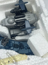 Load image into Gallery viewer, Model parts view featuring styrofoam packaging with various components in black, white, and yellow.