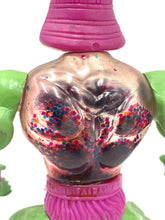 Carica l'immagine nel visualizzatore di Gallery, Detail of Speclatron Venum action figure with transparent torso and colorful internal design.