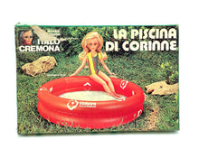 Load image into Gallery viewer, Italocremona doll set lifestyle shot featuring a child playing in a colorful inflatable pool.