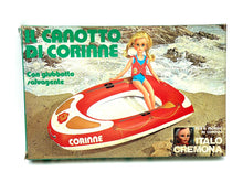 Load image into Gallery viewer, Italocremona doll set packaging featuring an inflatable boat toy with a child on a beach.
