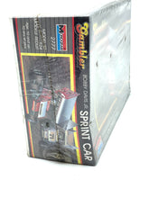 Load image into Gallery viewer, Monogram Gambler Sprint Car side view showcasing detailed parts in red, black, and yellow.