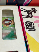 Load image into Gallery viewer, Close-up detail of the 1968 MB board game box with window cutout and illustrated design.