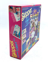 Load image into Gallery viewer, Mattel Barbie Skipper Boutique T-Shirt Shop packaging side view showcasing vibrant colors.