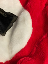 Load image into Gallery viewer, Close-up detail of red costume fabric showing soft texture and black detail.