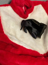 Load image into Gallery viewer, Detail view of red and white costume with zipper and black cape.