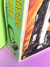 Load image into Gallery viewer, Tyco Racing Warriors game board detail displaying track layout and game components.
