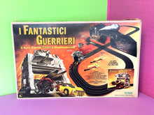 Load image into Gallery viewer, Tyco Racing Warriors packaging front view showing vibrant graphics and game title.