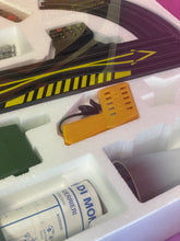 Load image into Gallery viewer, Tyco Racing Warriors various small items close-up displaying plastic packaging and visible label.