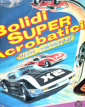 Load image into Gallery viewer, Detail close-up of the torn edge of the Tyco box showcasing colorful graphics.
