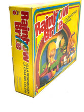 Load image into Gallery viewer, Side view of the Rainbow Brite toy set showcasing its colorful design and brand name.