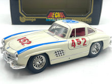 Load image into Gallery viewer, Burago Mercedes 300SL side view featuring number 452 and racing stripes.