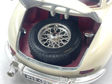 Load image into Gallery viewer, Burago Mercedes 300SL close-up of trunk showing spare tire and chrome wheel.