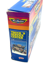 Load image into Gallery viewer, Galoob Micro Machines Truck 'N Service Centre side view showcasing the product name and design.