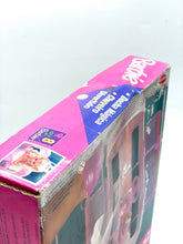 Carica l'immagine nel visualizzatore di Gallery, Close-up view of the doll packaging with colorful graphics and a transparent window.